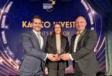 Hassan and Layla receiving the award